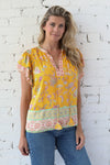 AVERY RAYNE </br>Border Print Flutter Sleeve Blouse
